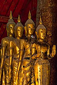 Luang Prabang, Laos - Wat Mai, detail of the Buddha altar inside the sim. 